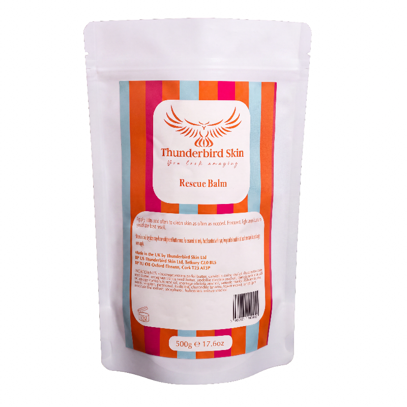 A 500g refill pouch of Thunderbird Skin Rescue Balm, featuring a colorful striped label with orange, pink, and blue stripes on a white background.
