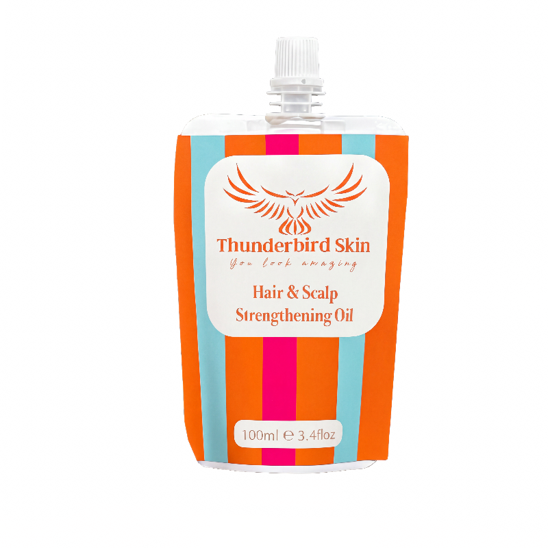 Thunderbird Skin Hair & Scalp Strengthening Oil in a 100ml refill pouch with a white cap, featuring orange, light blue, and magenta vertical stripes on a white background.